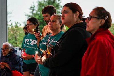 In San Antonio, tears, prayers and rain at a vigil for migrants who died in a sweltering trailer