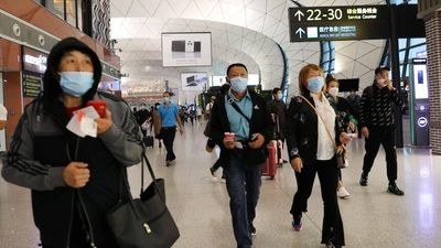 China slashes COVID-19 quarantine time by half for international travellers