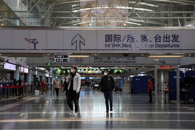 China's easing COVID curbs spark travel inquiry surge, and caution