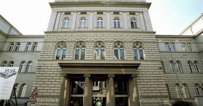 Man, 38, arrested after head left on steps of court building as body discovered near river