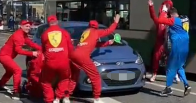 Stag do hold up traffic in Edinburgh city centre to perform hilarious Formula 1-style tyre change on passing car