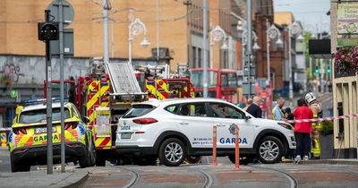 Emergency services rush to scene of fire in building beside Ashling Hotel in Dublin city