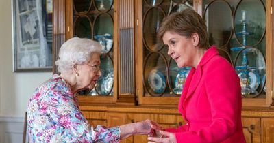 Queen seen with 'bruised' hand meeting Nicola Sturgeon as doctor gives possible cause
