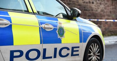 Man found 'hiding in loft' after woman seen with injuries