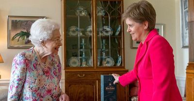 Nicola Sturgeon gifts The Queen special bottle of whisky during Edinburgh meeting