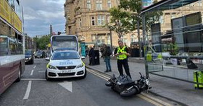 Major city road blocked after scooter collides with car