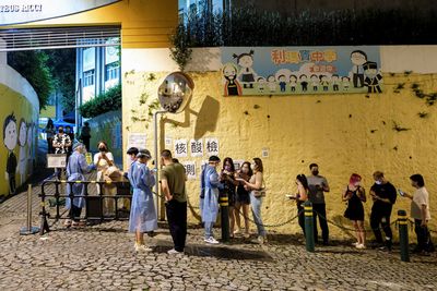 Macau COVID infections rise as spread extends to medics, police