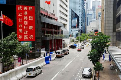 Business leaders say new Hong Kong chief must open up city, rebuild its image