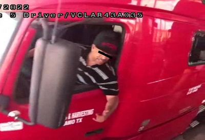 Arrested driver pictured smiling as he transported doomed migrant truck across the border