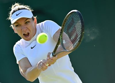 Former Wimbledon champ Halep advances to third round