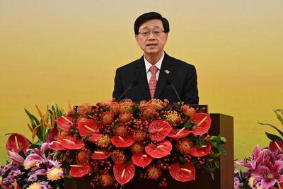 Enforcer of Hong Kong security law sworn in as city's new leader