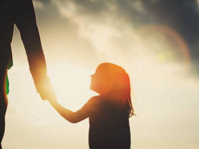 Viral: Baby girl impresses internet after she pushes her Dad on a slide and gives herself a 'push'