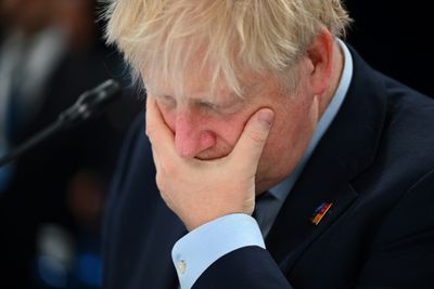UK PM back in crisis mode after foreign tour