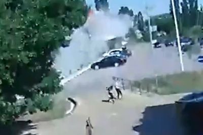 Terrified shoppers run for cover in new footage of Russian attack on Ukraine mall