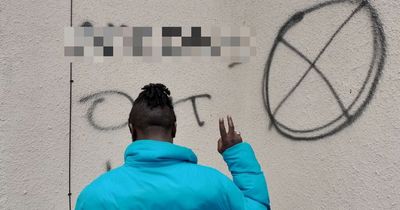 Belfast man defiant after home targeted with racist graffiti