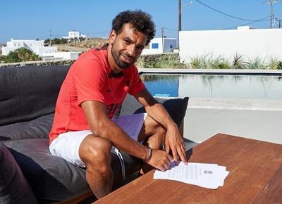 Mohamed Salah signs new three-year Liverpool contract to extend Anfield stay