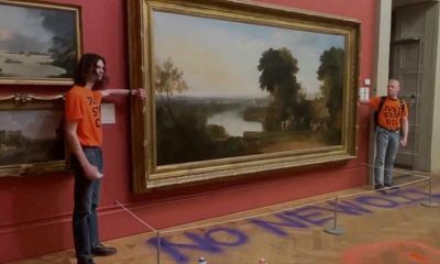 Just Stop Oil activists glue themselves to Turner painting frame in Manchester