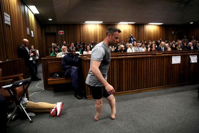 Jailed South African paralympic star Pistorius met victim's father