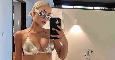 Kim Kardashian sizzles in metallic silver bikini after 21lbs weight loss