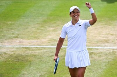 Serena's conqueror Tan into Wimbledon fourth round
