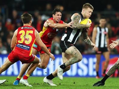 Magpies edge Suns in an AFL thriller