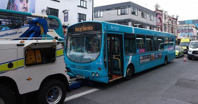Two buses crash in city centre as traffic lights go out at busy junction