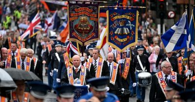Orange Walk marchers descend on Glasgow streets as roads remain closed
