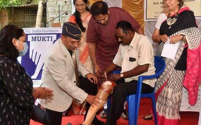 Wheelchairs, artificial limbs distributed