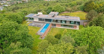 Millionaire mega-mansion secluded in former quarry for sale