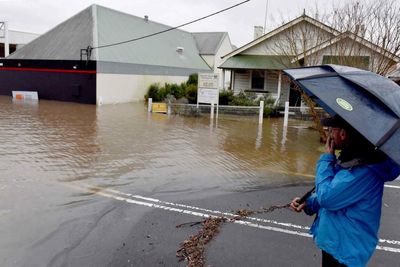Sydney floods: residents brace for another day of devastating weather as NSW coast battered by rain