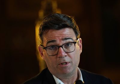 Andy Burnham backs strike action but downplays leadership ambitions