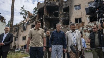 Albanese walks among Ukraine destruction