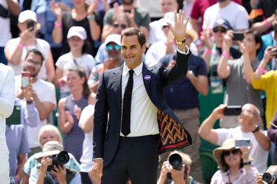 Centre Court gives Roger Federer standing ovation during centenary celebration