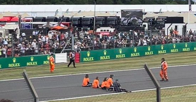 Protestors storm track on first lap of British GP immediately after horror F1 crash