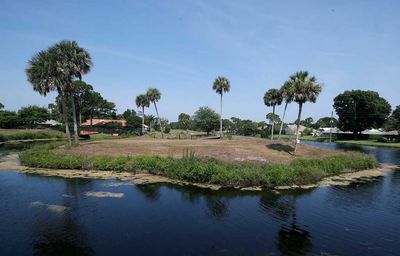 A pair of Florida golf courses could be restored, but residents say they’re financing the whole deal