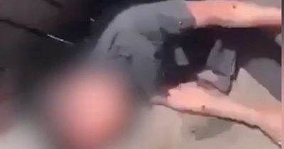 Police investigate serious assault and three other incidents after disturbing video circulates showing boy covered in blood and screaming on the ground in Oldham