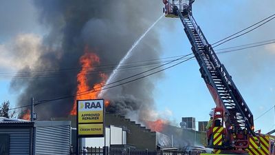 Fire destroys warehouse at Brompton, sparking street argument between business owners