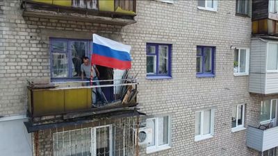 Ukrainians take up new positions as Putin proclaims victory in Luhansk