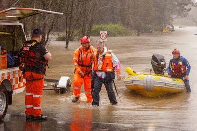 Sydney floods force tens of thousands to flee homes