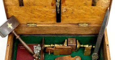 Antique vampire-slaying kit containing crucifixes and holy water sells at auction for £13,000