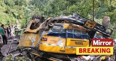 India bus crash: Sixteen dead including school children as vehicle falls off cliff