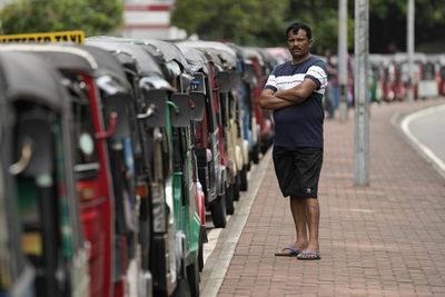 With no fuel and no cash, Sri Lanka grinds to a halt