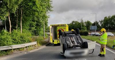 Major Dublin roundabout closed as car overturns in terrifying early-morning crash