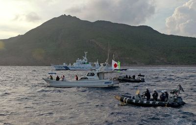 Japan sights China, Russia warships near disputed islands