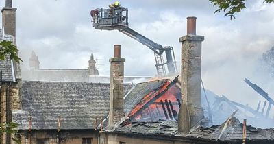 Flames engulf rooftop of derelict building in Scots town as crews battle blaze