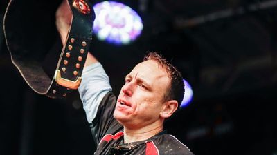 Joey Chestnut Takes Down Protestor During Hot Dog Eating Contest