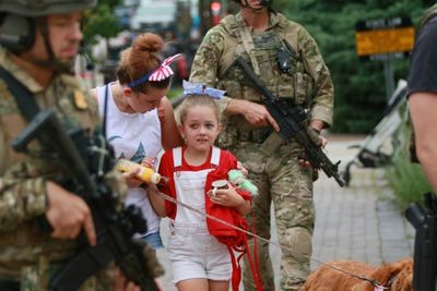 Police arrest suspect after gunman kills six at US July 4 parade