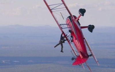 Up, up and away! Tom Cruise goes from Maverick to Mission Impossible with death defying stunts