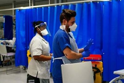 Covid: Hospitals reintroduce face masks and social distancing as cases rise