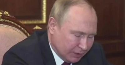 Puffy-faced Vladimir Putin struggles to stay awake as he looks exhausted during meeting